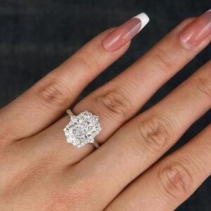 Radiant halo engagement ring